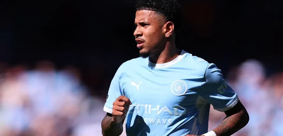 Player in light blue Manchester City kit during match