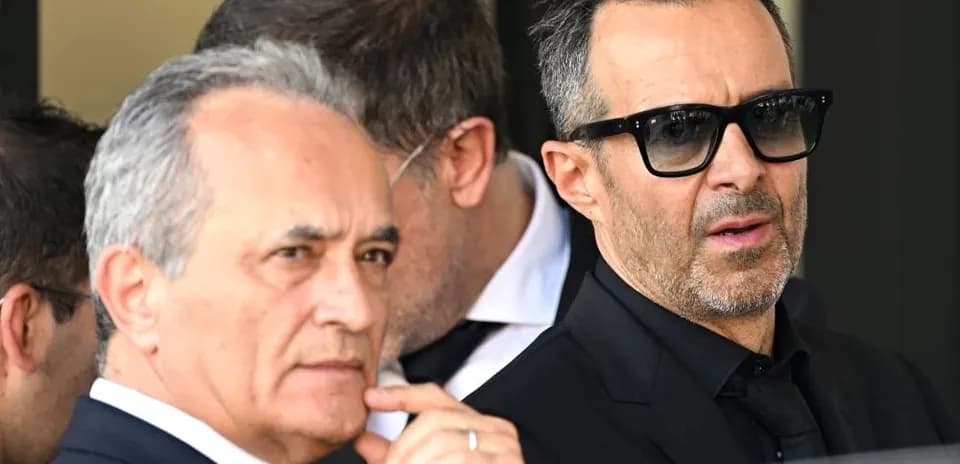 Two men in formal attire at event