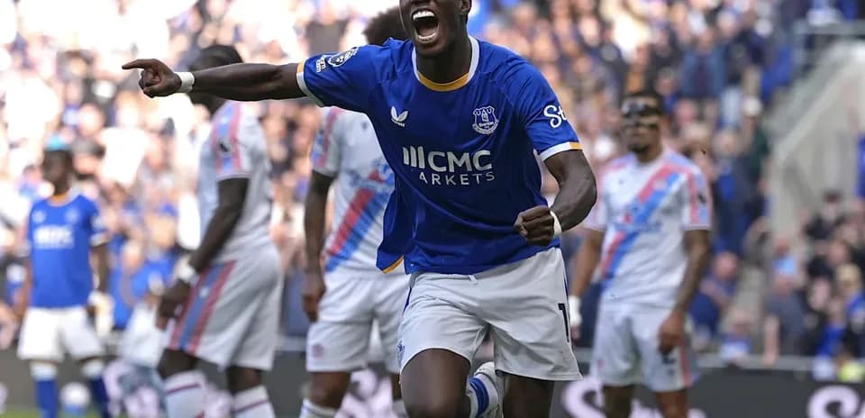 Everton player celebrating after scoring a goal
