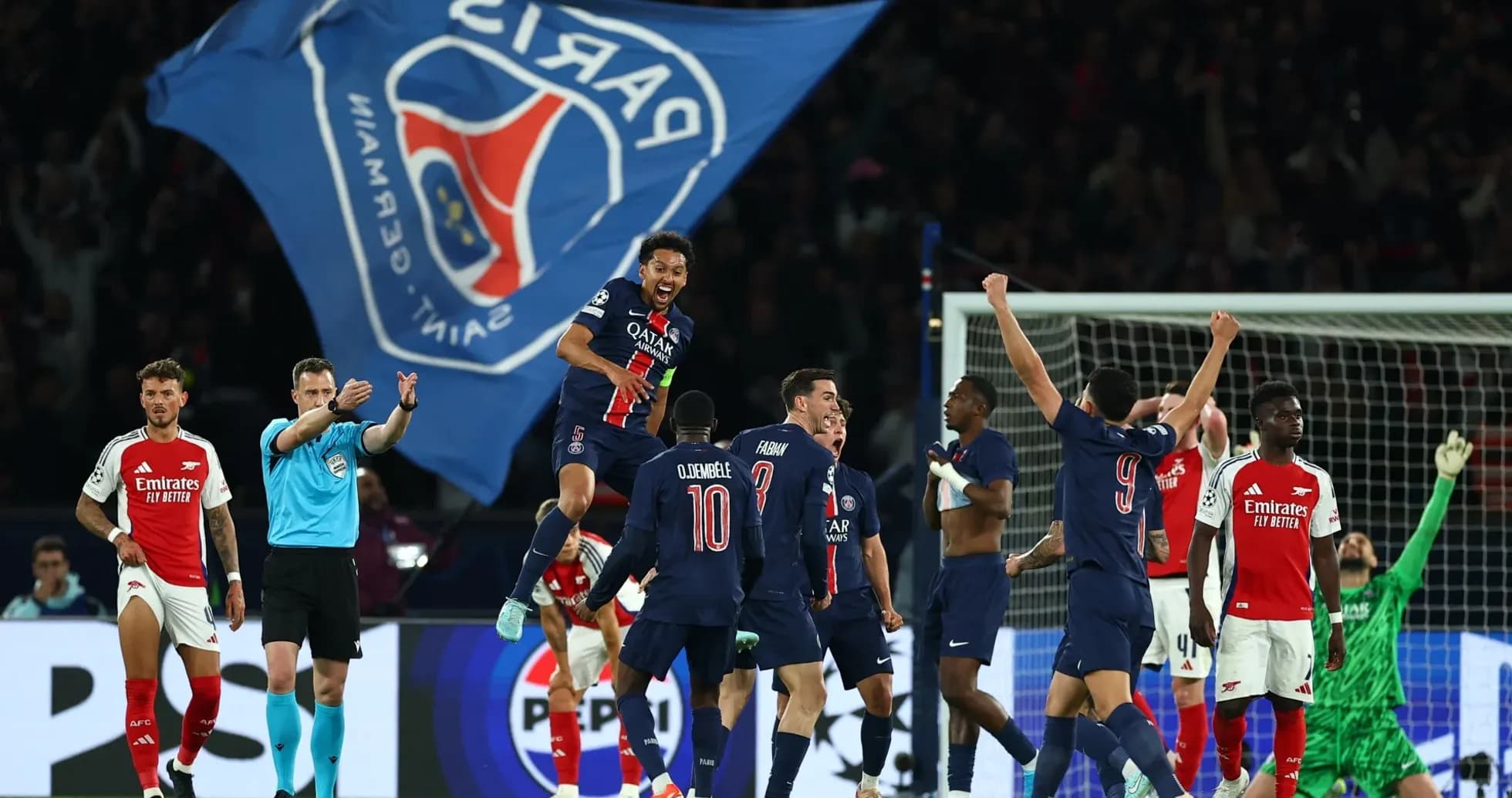 Players celebrating after scoring a goal