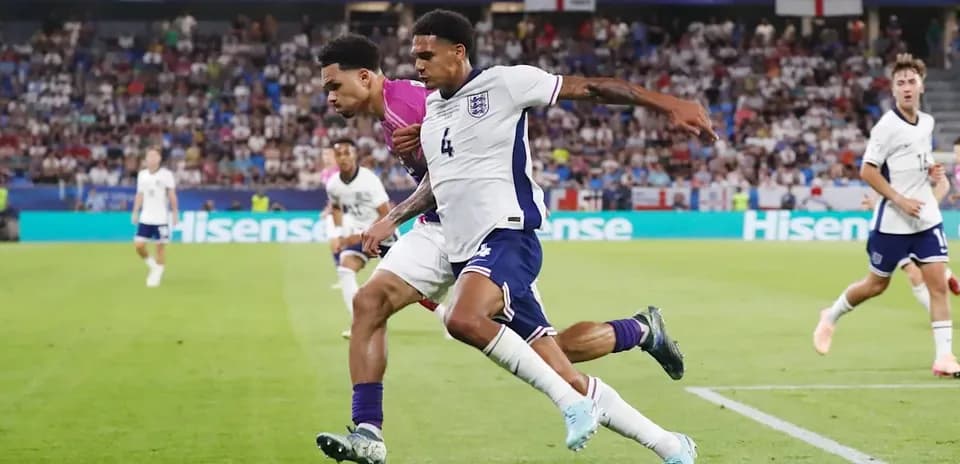Two players battling for the ball during match