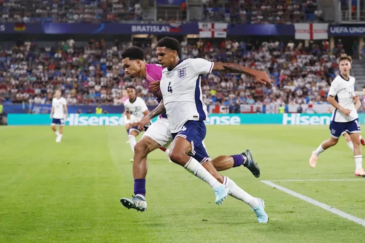Two players battling for the ball during match