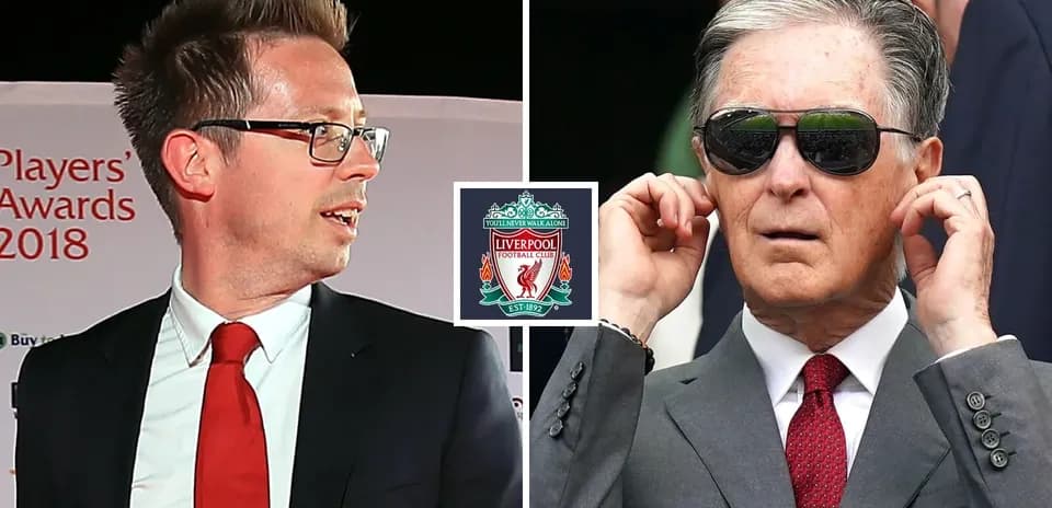 Two men at Liverpool FC event with club logo
