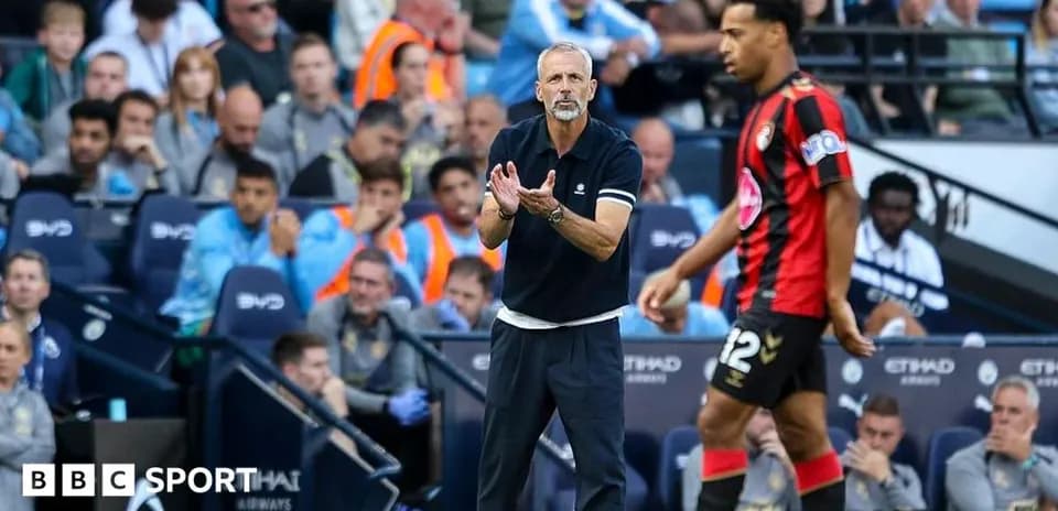 Bournemouth coach instructing player during match