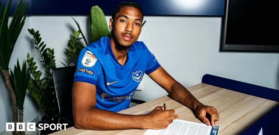 Player signing contract at Portsmouth club office