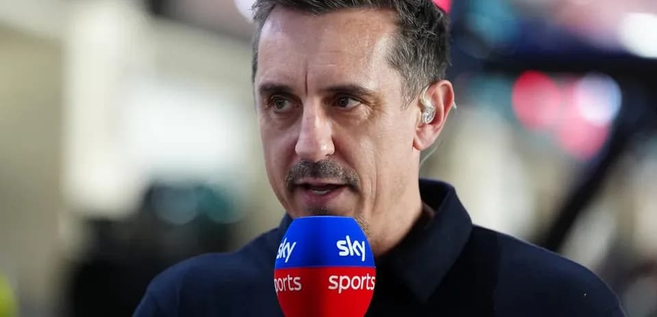 Sports commentator speaking into a microphone