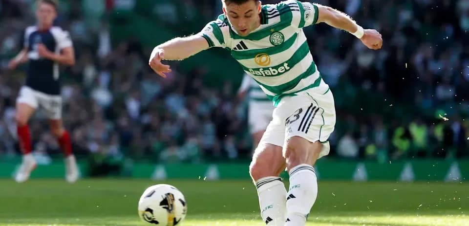 Player kicking the ball on the pitch during match