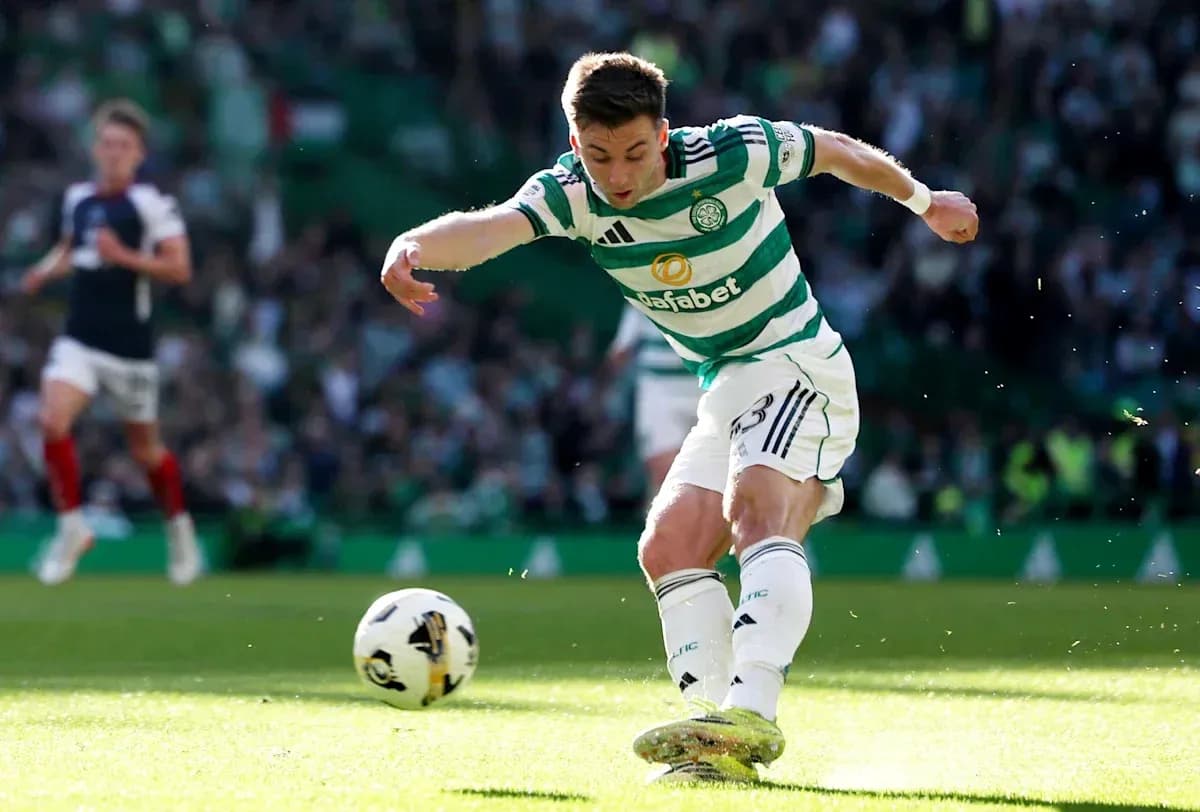 Player kicking the ball on the pitch during match