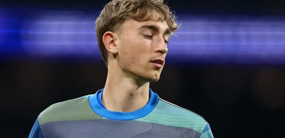 Goalkeeper wearing Real Madrid kit during match
