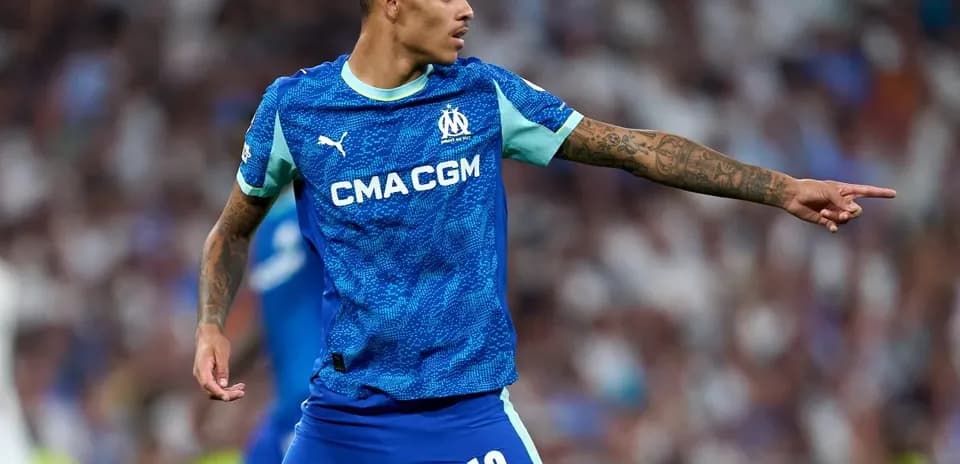 Player gesturing during match in blue kit