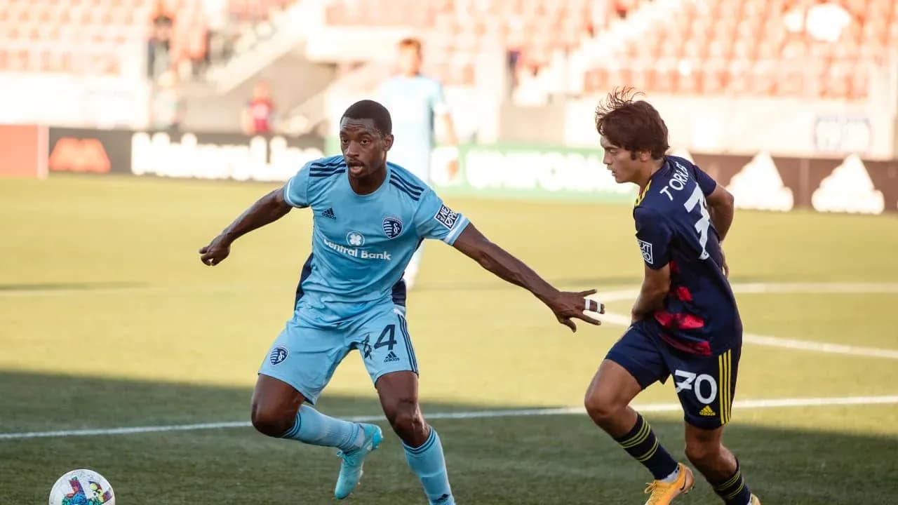 Players competing for the ball during match