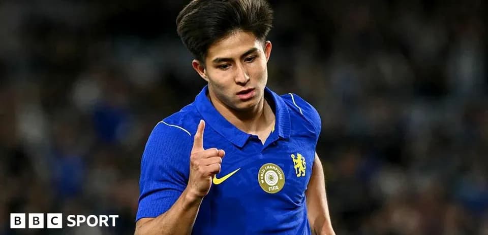 Player celebrating a goal in blue team jersey