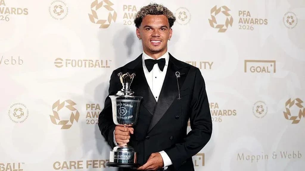 Player holding award at PFA Awards ceremony