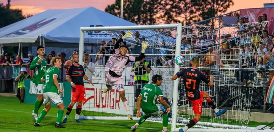Goalkeeper jumping during Indy Eleven match