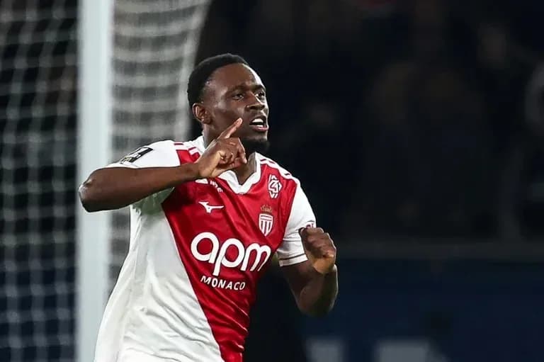 Player celebrating a goal for AS Monaco