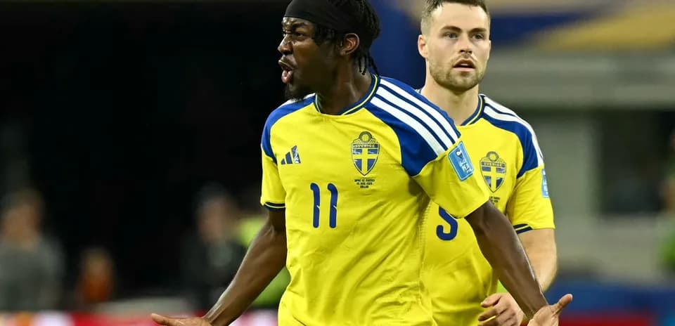 Swedish players celebrating during a football match