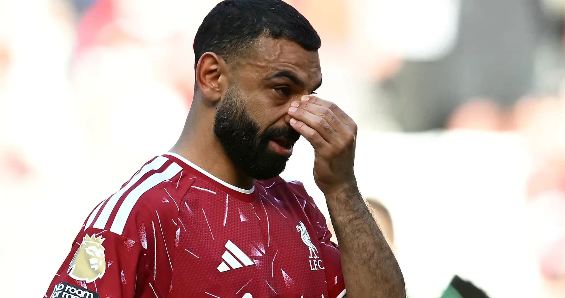 Player wiping his face during a match