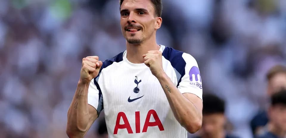 Player celebrating after scoring for Tottenham