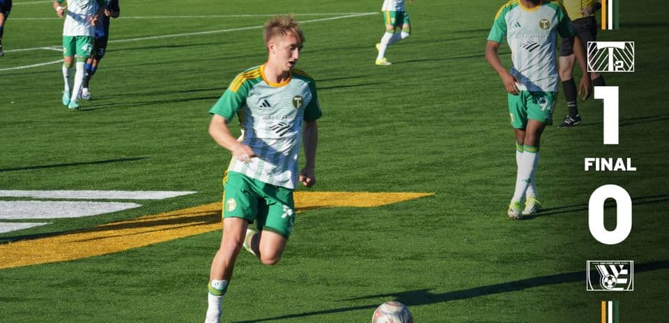 Portland Timbers II player dribbling during match