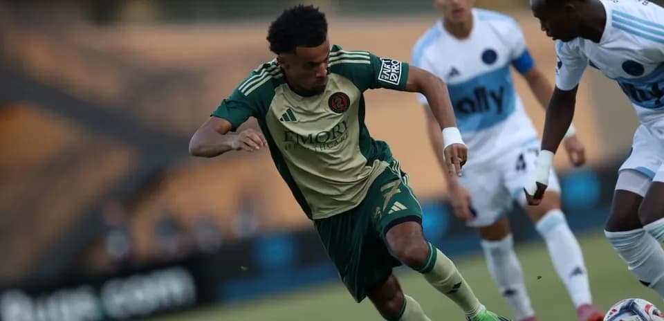 Player dribbling during Atlanta United II match