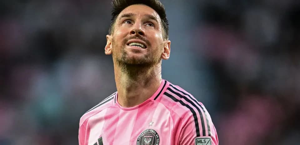 Player looking up while wearing pink jersey
