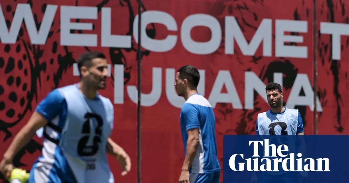Players training near 'Welcome to Tijuana' sign