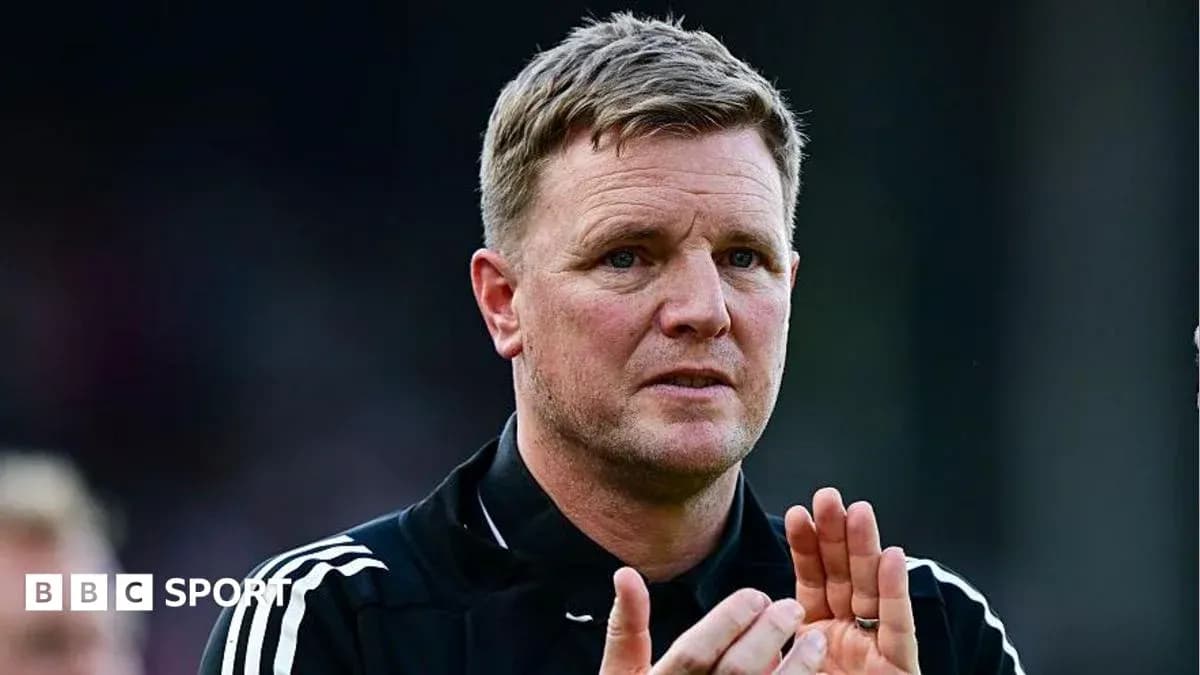 Manager clapping during a football match