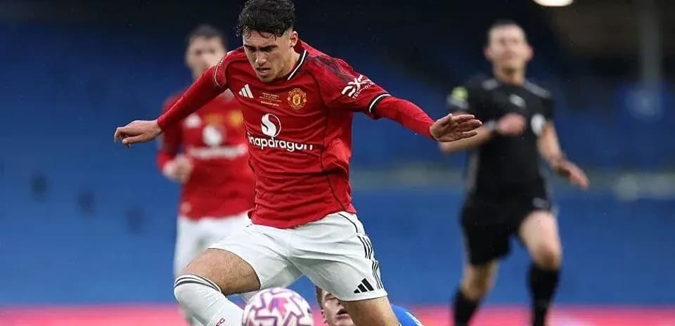 Player in red jersey falling during a match