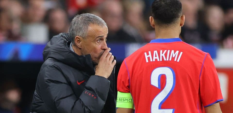 Coach giving instructions to player Hakimi during match