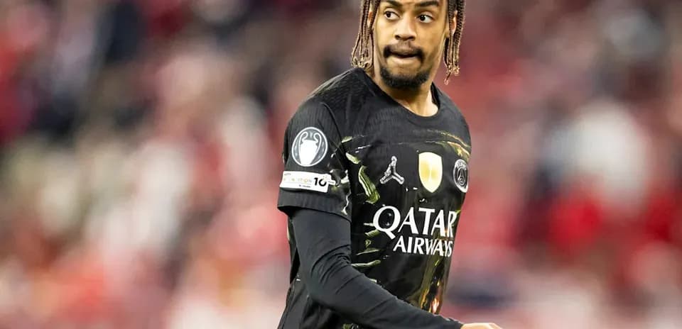 Player in black jersey during football match