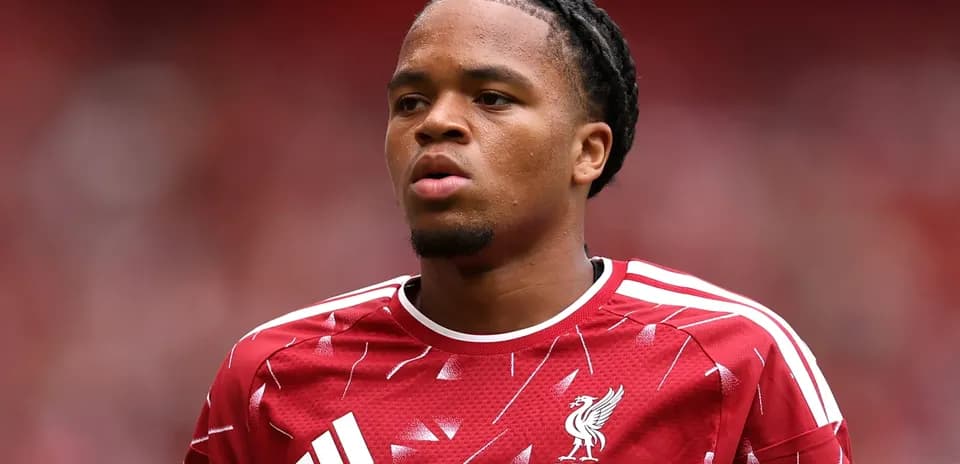 Player in Liverpool jersey during match warm-up