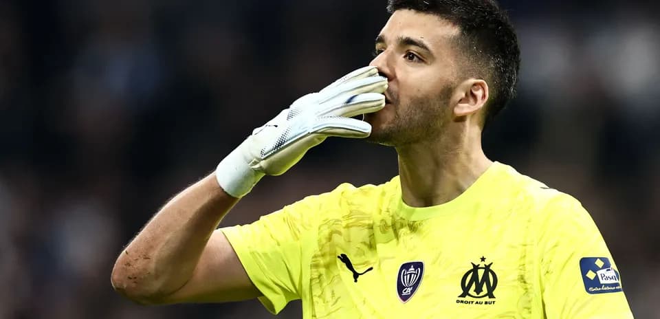Goalkeeper celebrating with a hand gesture