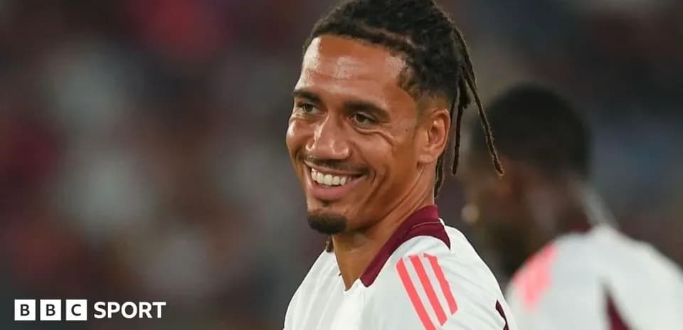 Player smiling during warm-up before the match