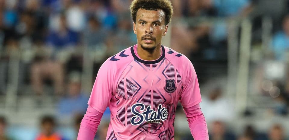 Goalkeeper in pink jersey during match