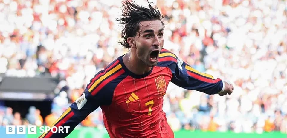 Player celebrating after scoring for Spain