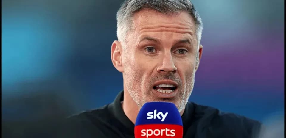 Sports analyst speaking into microphone during broadcast