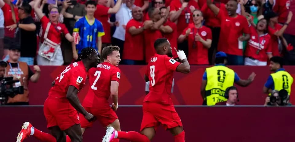 Canadian players celebrating a goal during match
