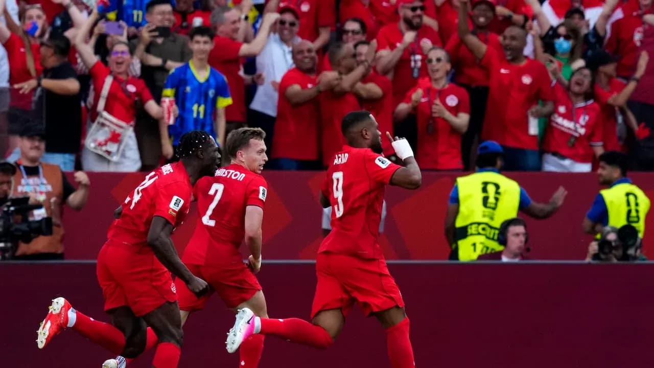 Canadian players celebrating a goal during match