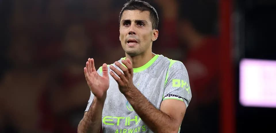 Player applauding fans during a match