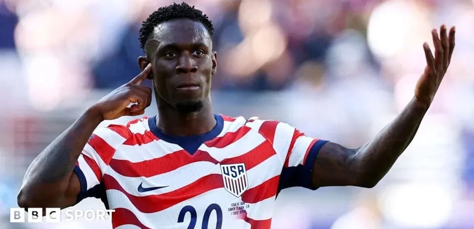 Player celebrating with hand gesture during match