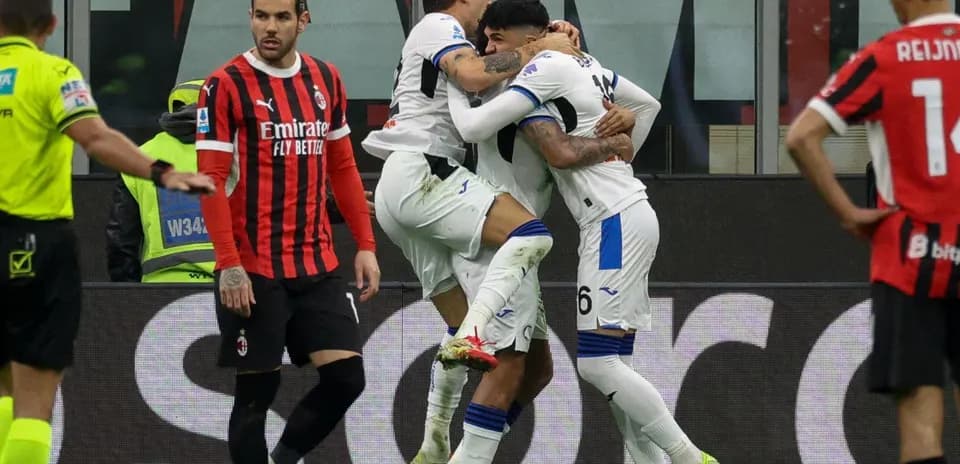 Atalanta players celebrating a goal against AC Milan
