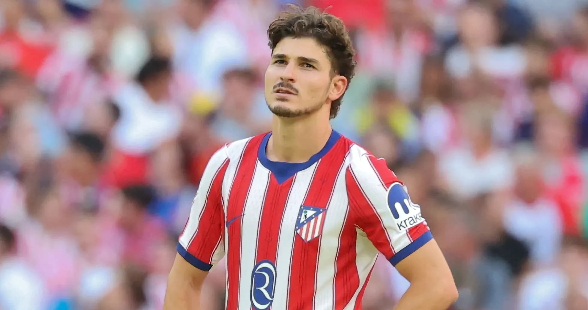 Player in Atlético Madrid jersey during match