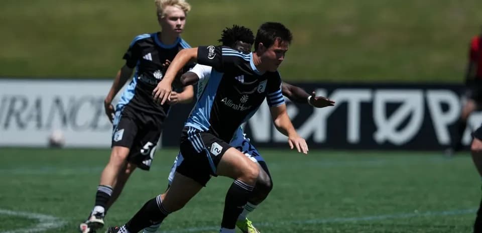 Player sprinting with ball during Austin II match