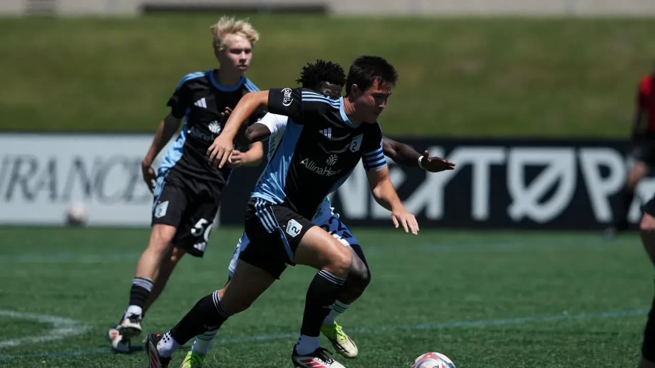 Player sprinting with ball during Austin II match