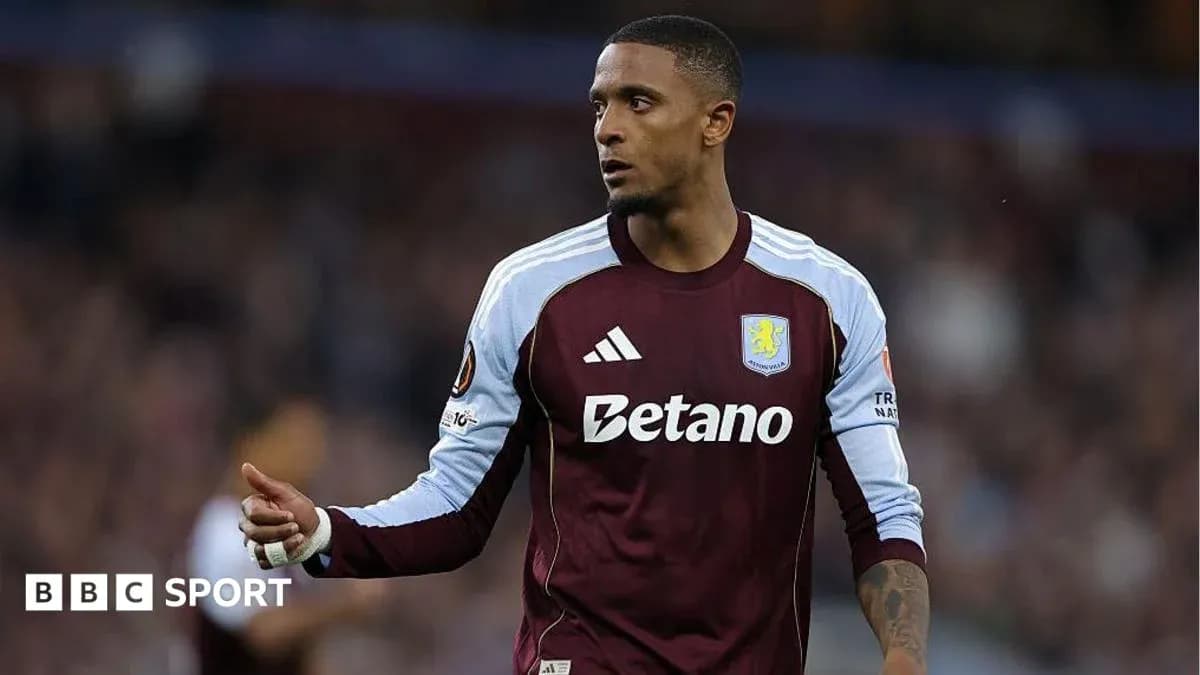 Player gesturing during match in Aston Villa kit