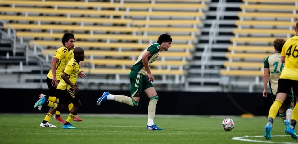 Connecticut FC player running with the ball