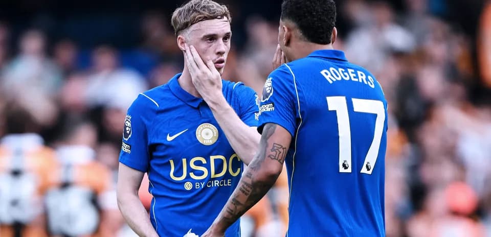 Two players discussing during a football match