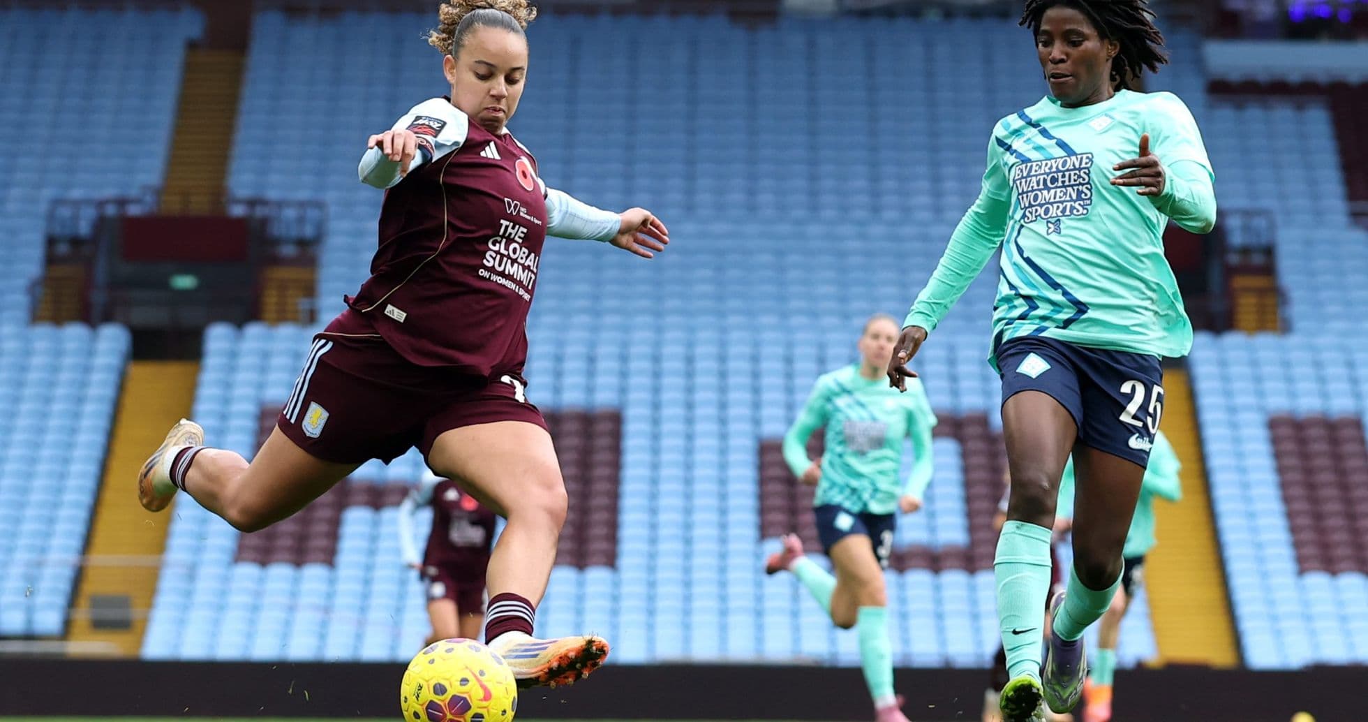Aston Villa player kicking ball during match