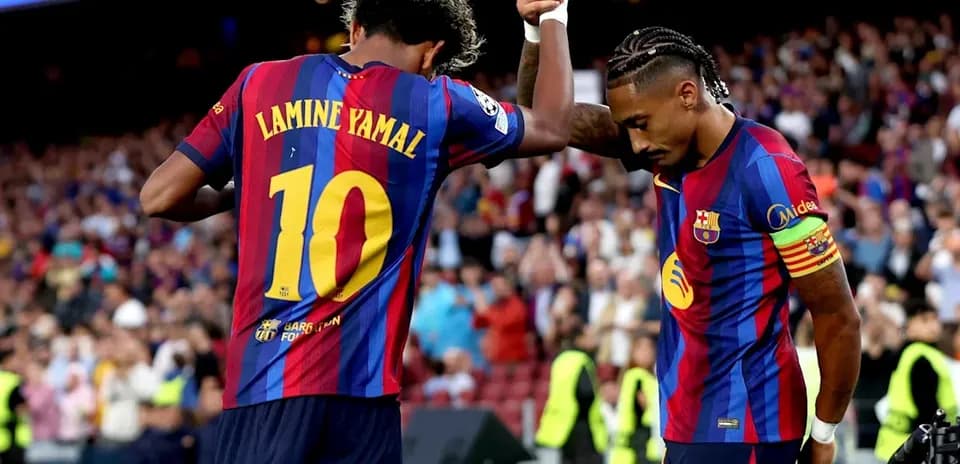 Lamine Yamal celebrating with teammate after goal