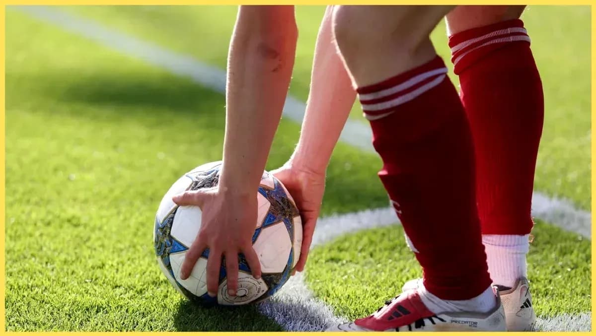Player preparing to take a corner kick